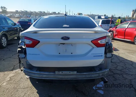 2014 Ford Fusion Hybrid Titanium from USA, damaged, VIN 3FA6P0RU6ER291659